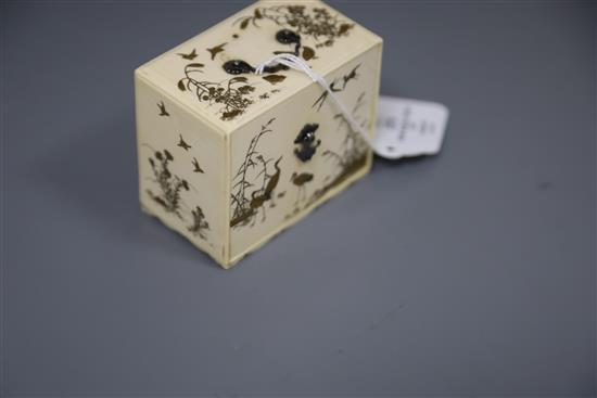 A Japanese gilt lacquered ivory model of a picnic set (Sage Jubako), Meiji period, H. 7cm, W. 8.3cm